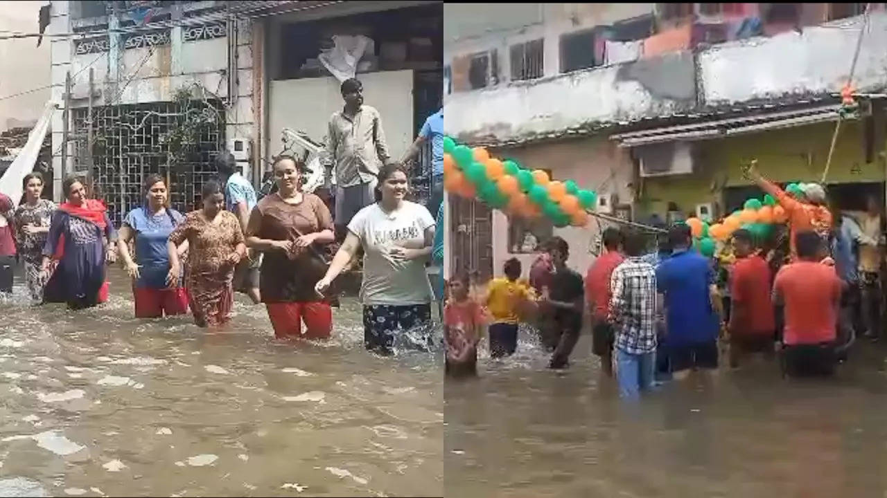 gujarat rains: vadodara locals perform garba knee-deep in floodwater