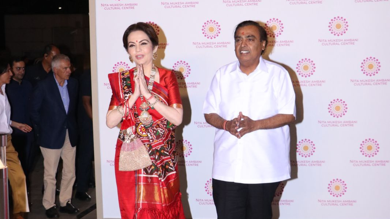 nita ambani stuns in deep red patola saree with radha-krishna printed on the blouse for theatre show at nmacc