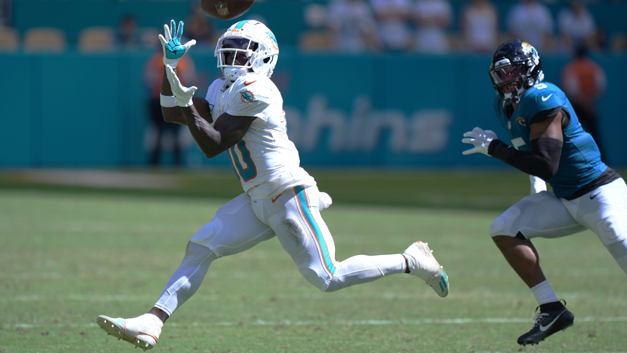 tyreek hill mocks arrest with 'handcuff' celebration after td vs jaguars | watch