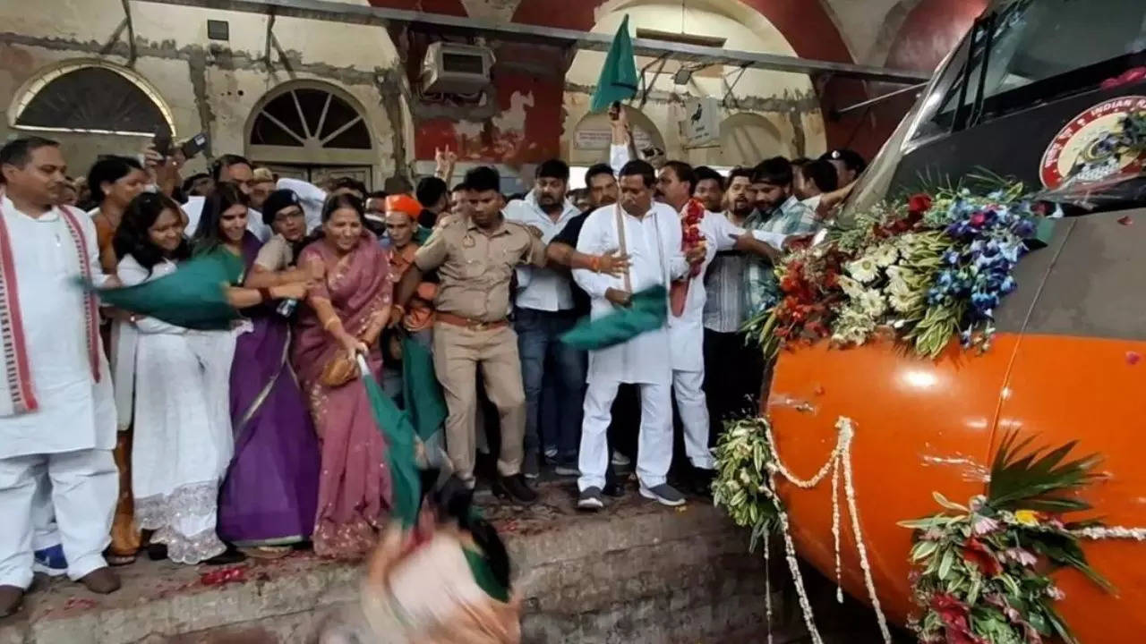 bjp mp loses balance while flagging off vande bharat express, falls on track - video