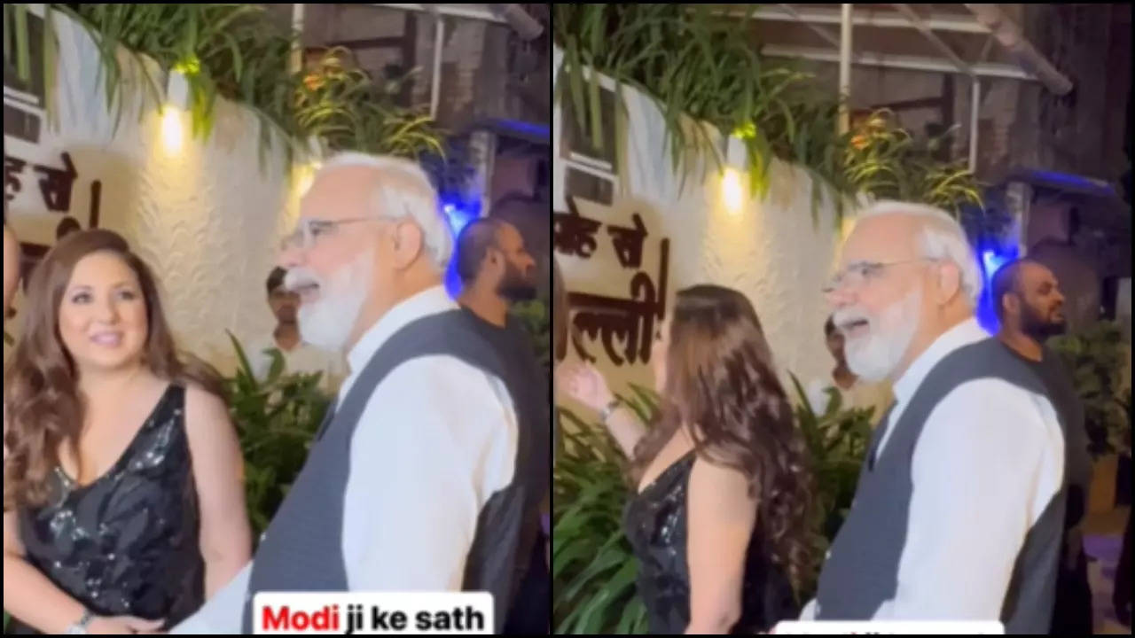 munisha khatwani shakes hand with 'narendra modi' at her b'day party, netizens are baffled