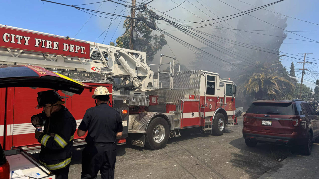 redwood city fire: police, fire crew respond to blaze in building on poplar avenue