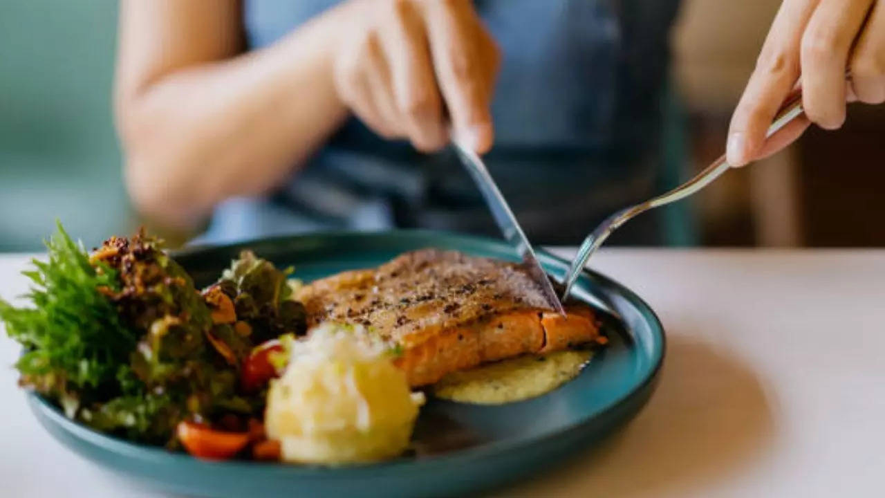 eating fish regularly linked to lower risk of dementia and alzheimer’s: study