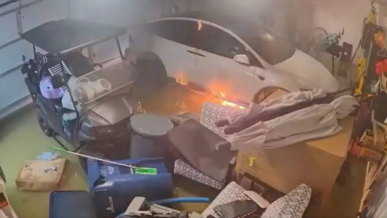 Tesla Erupts In Flames Inside Flooded Florida Garage: Shocking Video From Hurricane Helene Goes Viral