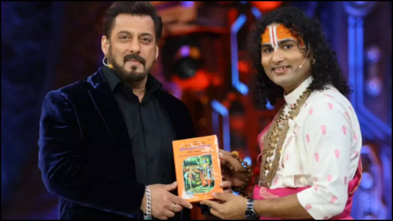 bigg boss 18: guru aniruddhacharya gifts a bhagwat gita to host salman khan - see pic