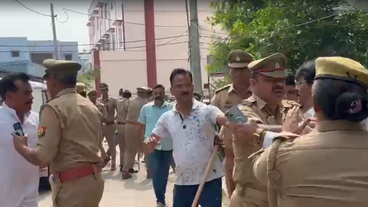 bjp mla yogesh verma assaulted in public after altercation over urban cooperative bank poll - video