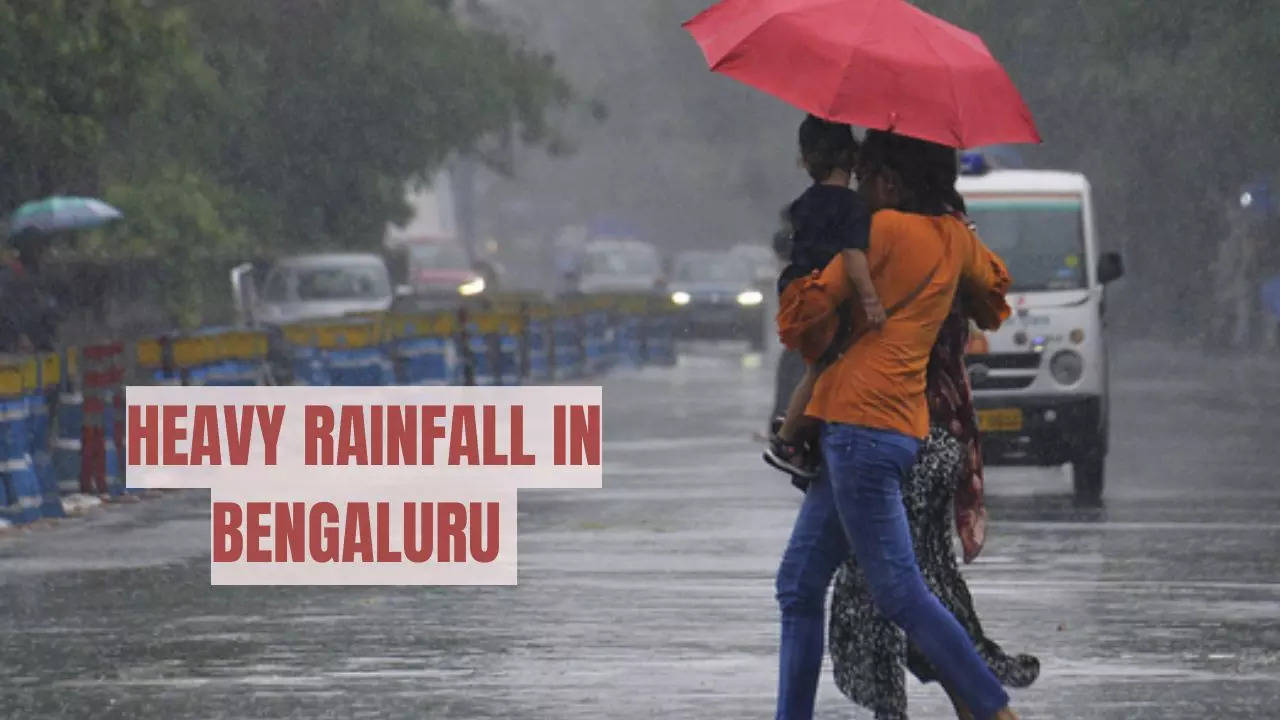 heavy rainfall bangalore:  schools news today flooding , traffic jams strike amid imd yellow