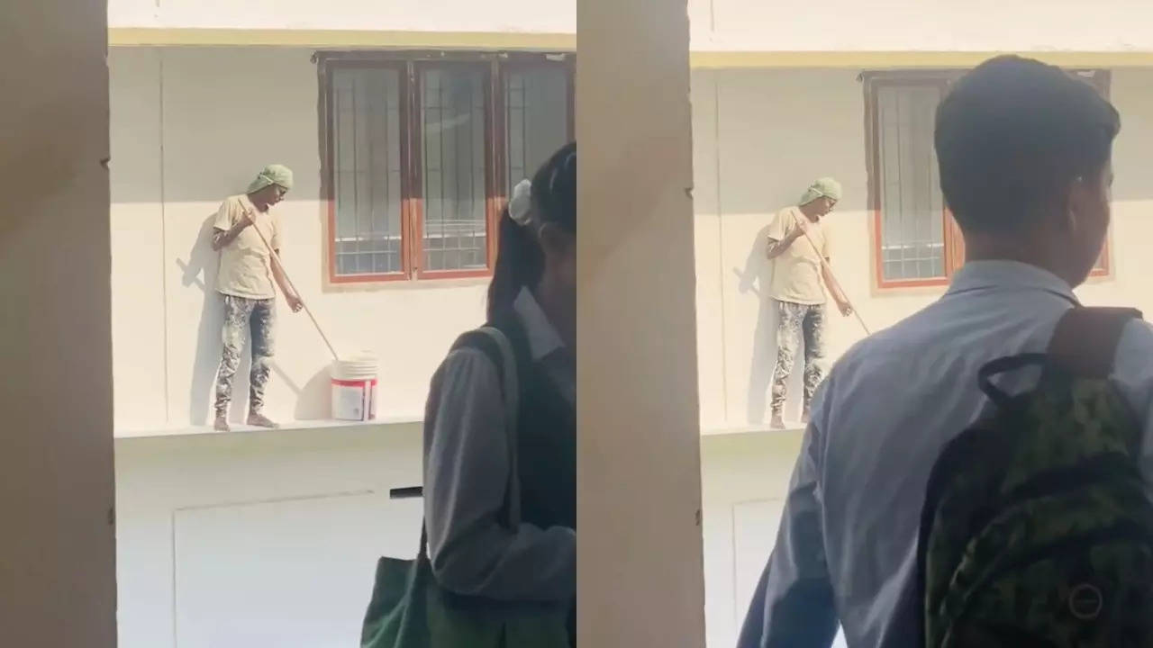 this video of a painter pausing work for the national anthem while students walk has clocked over 5 crore views. have you watched it?