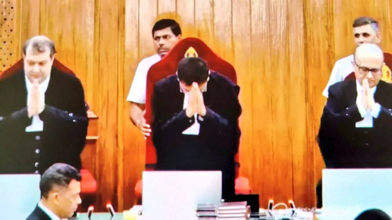 cji chandrachud bids farewell: viral photo captures final rise from supreme court chair