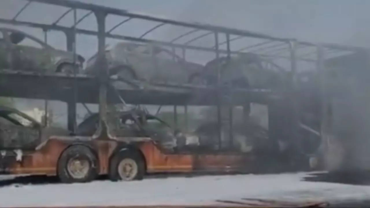 fire breaks out in container transporting cars to mumbai from hyderabad on highway near zaheerabad