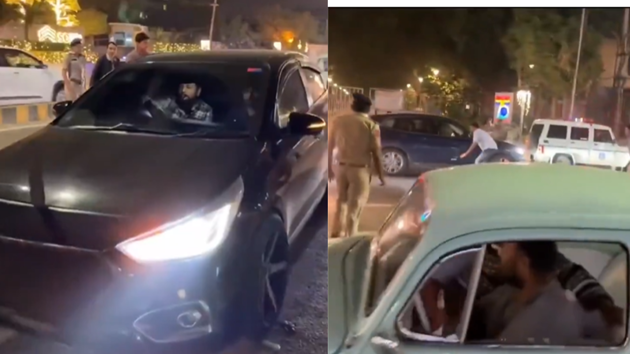 watch: ahmedabad youth in car without number plate tries to run over cops; gets caught