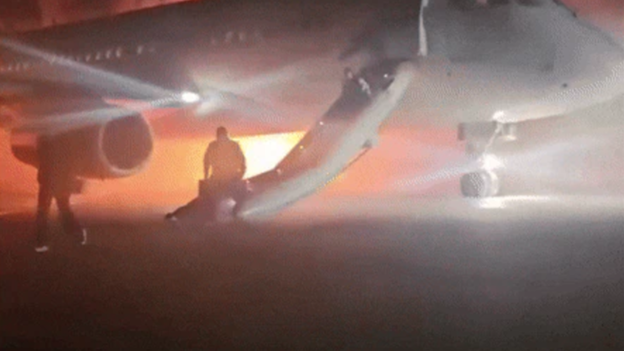 russian plane boarding 89 passengers catches fire in turkey, emergency slides deployed-watch