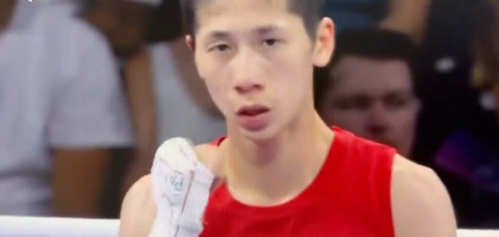 Taiwan boxer in Olympics gender row reaches quarter-finals