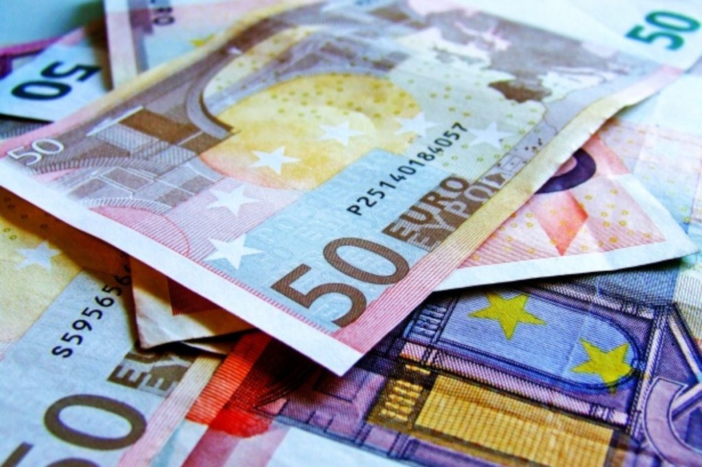 Euro back above parity with dollar